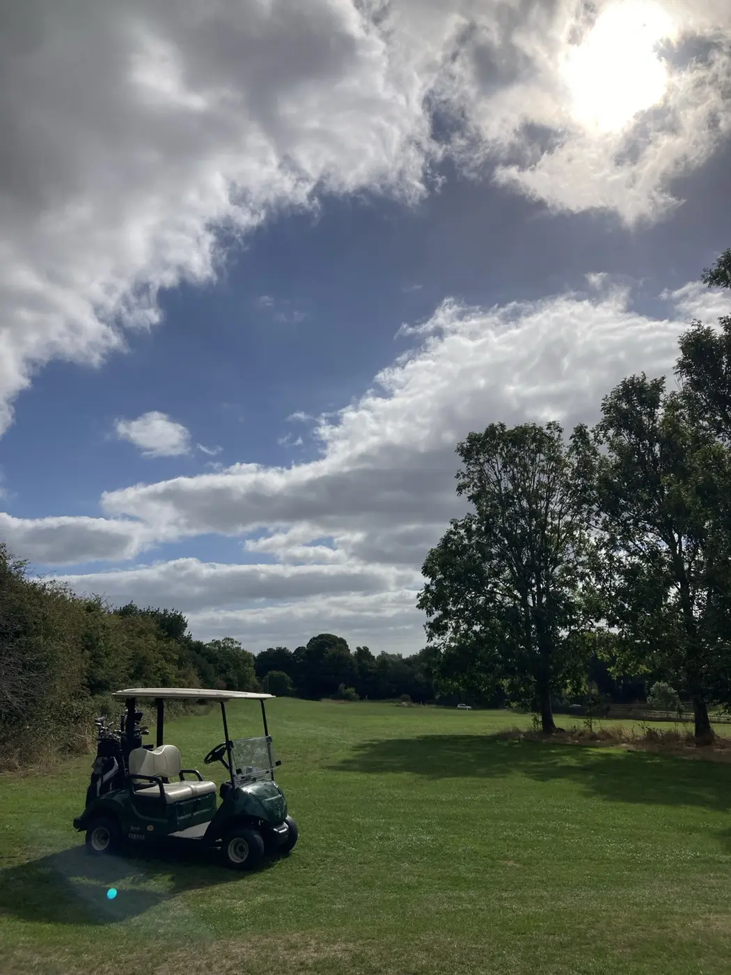 A golf buggy on the fairway at Wolfedale Golf Course